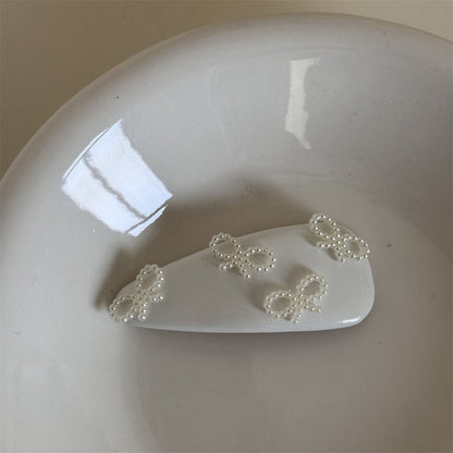 珍珠皮革蝴蝶結髮夾