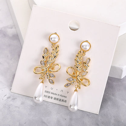 S925金色珍珠麥穗耳釘－商品主圖｜https://igowo.tw/