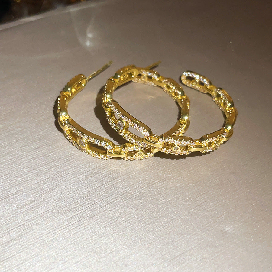 鋯石圓形鏤空耳釘