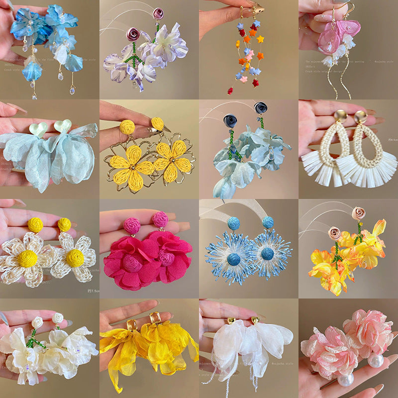 珍珠花朵流蘇簡約耳環－商品主圖｜https://igowo.tw/