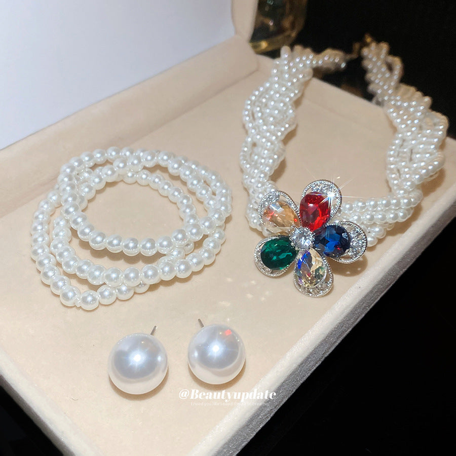 珍珠花朵項鍊耳環組－商品主圖｜https://igowo.tw/
