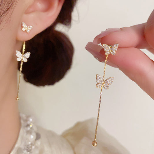鋯石蝴蝶流蘇耳墜－商品主圖｜https://igowo.tw/