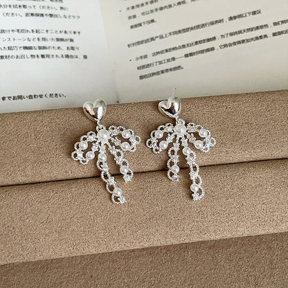 珍珠蝴蝶結垂墜耳釘