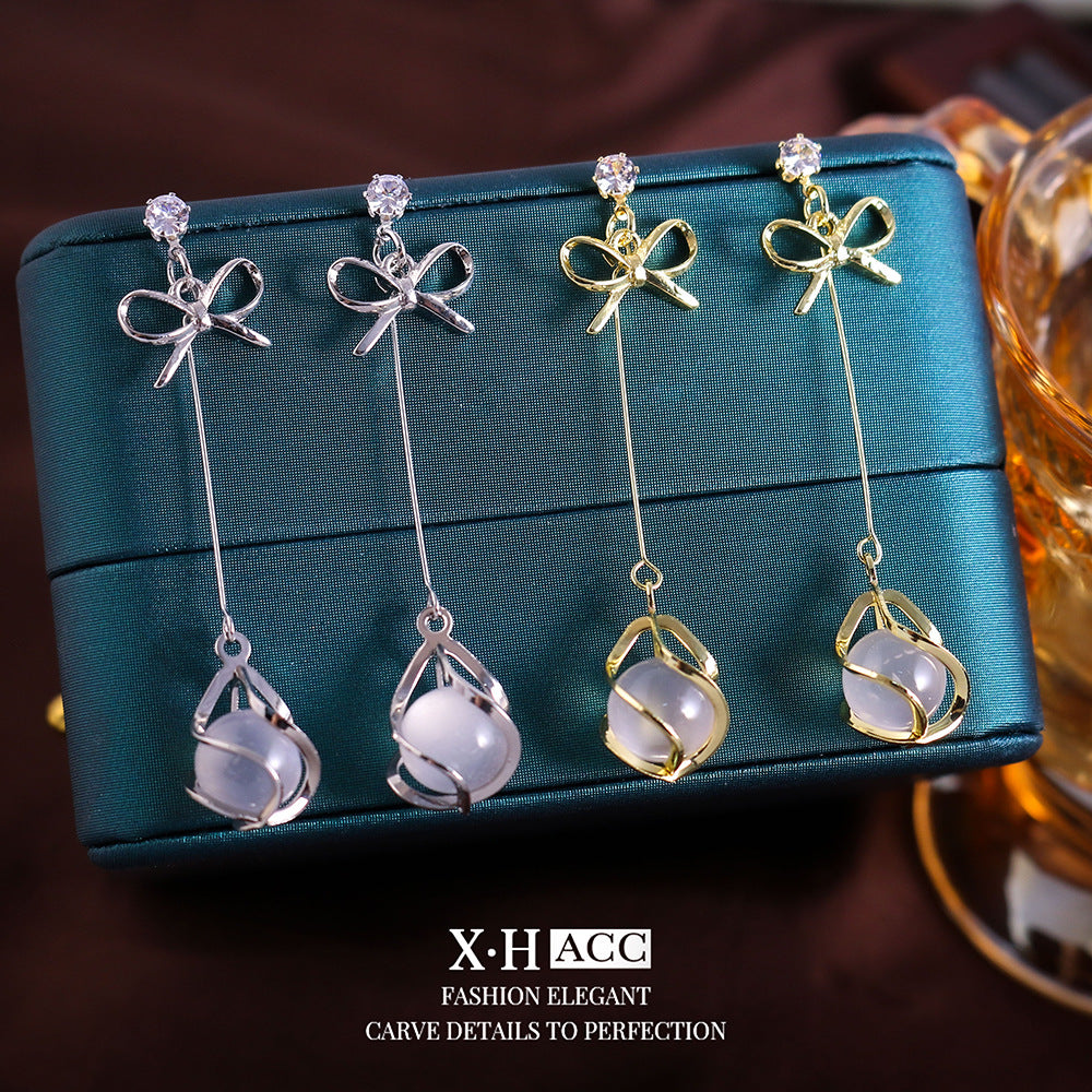 貓眼石蝴蝶結簡約耳釘－商品主圖｜https://igowo.tw/