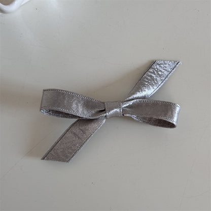 皮革金屬蝴蝶結髮夾－銀色-結上結夾款細節｜https://igowo.tw/