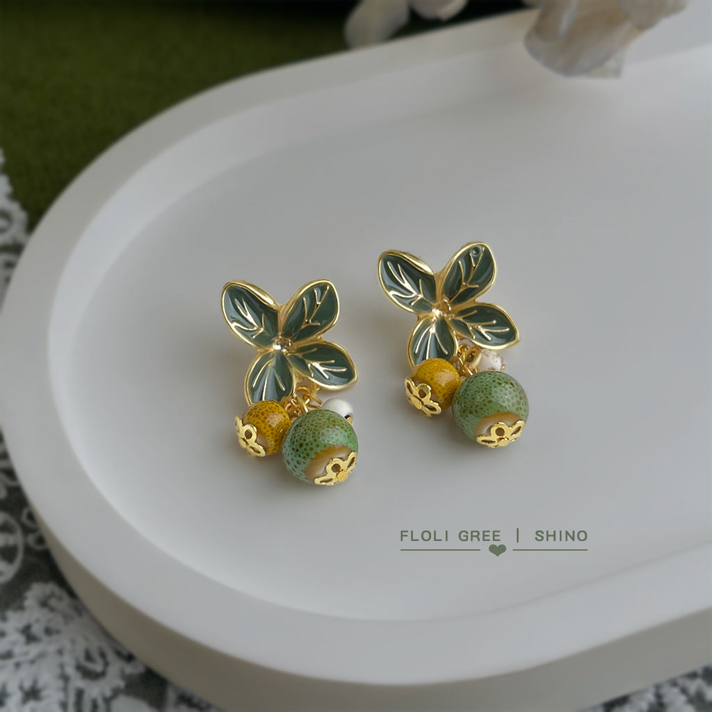 琺瑯陶瓷花朵耳環－商品主圖｜https://igowo.tw/