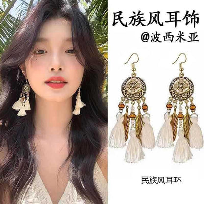 波西米亞民族風流蘇耳環長款小眾編織羽毛耳墜新款旅游穿搭耳飾女