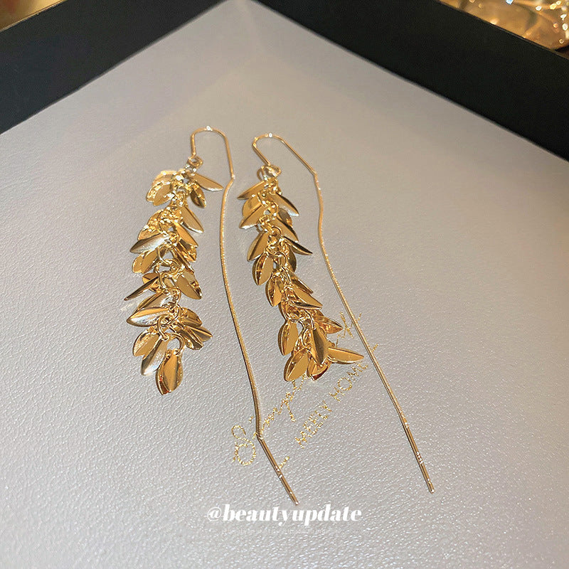 金色樹葉流蘇長版耳鉤－銀針-銀色款實拍｜https://igowo.tw/