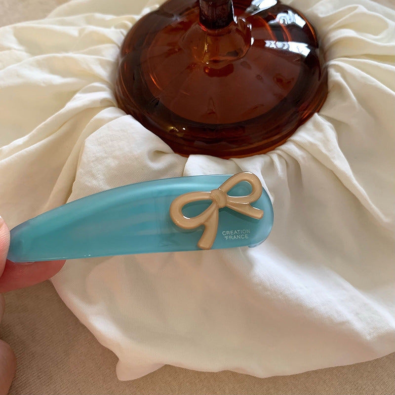 撞色蝴蝶結三角形髮夾