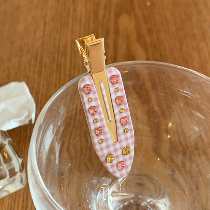 珍珠花朵髮夾－白色蝴蝶款細節｜https://igowo.tw/