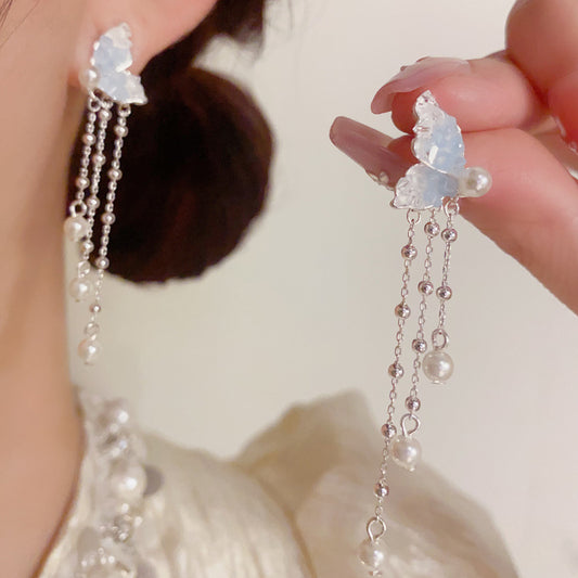 水晶珍珠蝴蝶流蘇耳墜－商品主圖｜https://igowo.tw/
