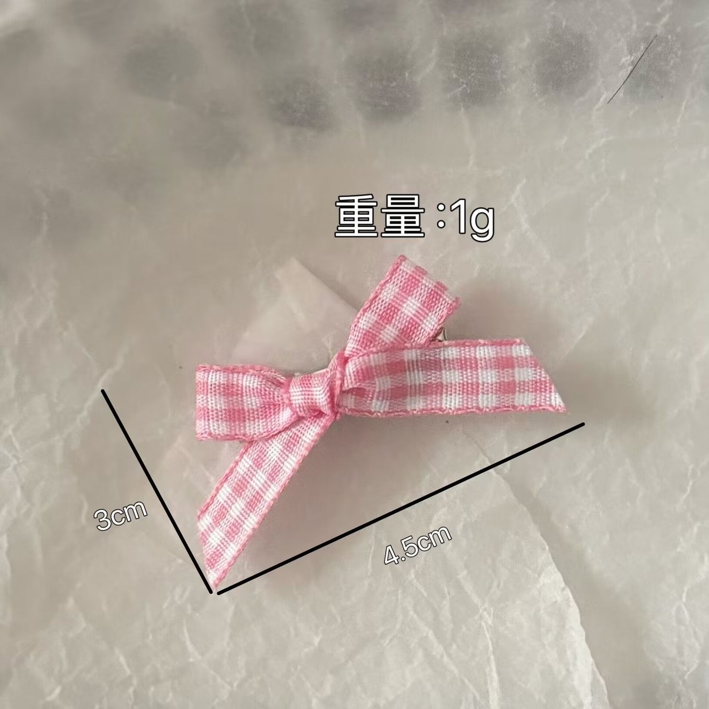 粉色蝴蝶結髮夾
