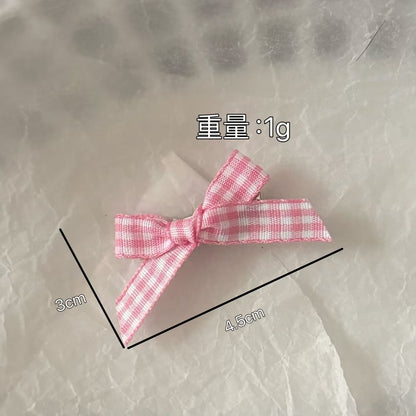 粉色蝴蝶結髮夾