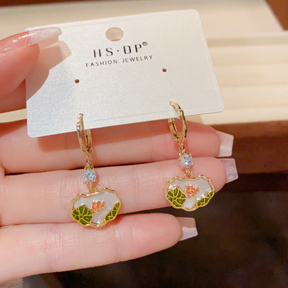 貝殼花朵耳扣－商品主圖｜https://igowo.tw/
