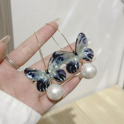 蝴蝶結花朵耳環－細節特寫40｜https://igowo.tw/