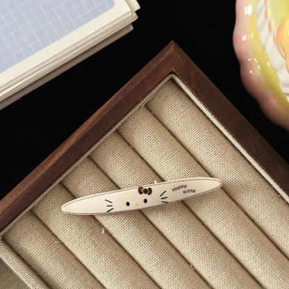 棕色貓咪橢圓髮夾－三個貓頭髮夾款細節1｜https://igowo.tw/