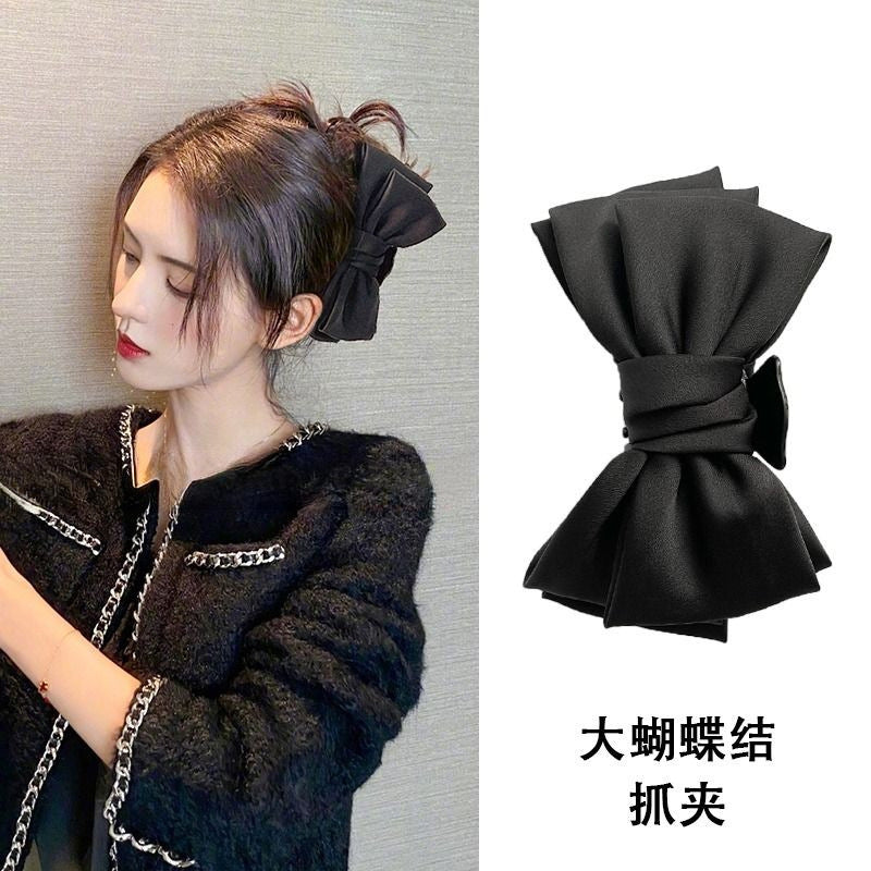 黑色蝴蝶結雙面鯊魚夾－商品主圖｜https://igowo.tw/