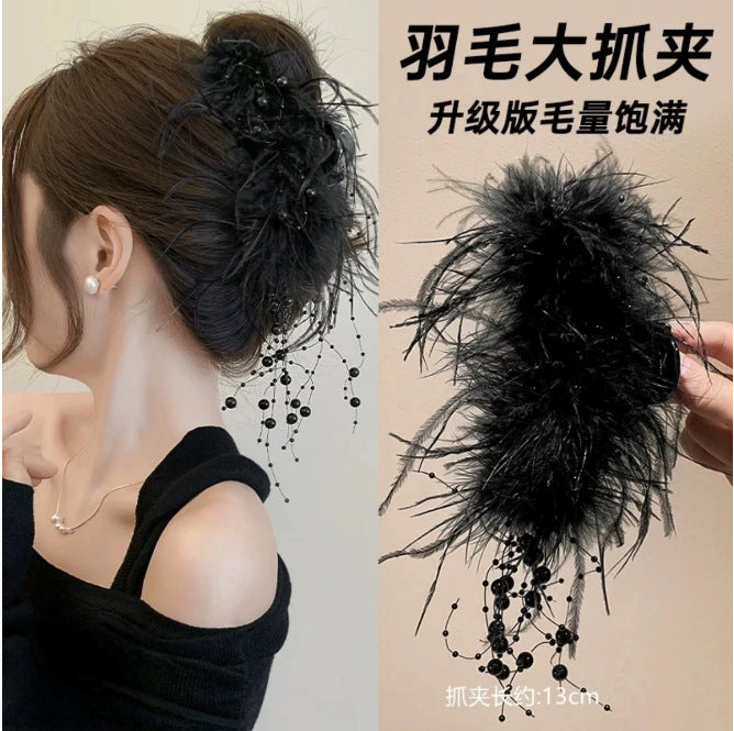 羽毛流蘇鯊魚夾－小號-11cm款實拍｜https://igowo.tw/