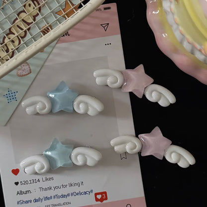 粉色星星翅膀髮夾－商品主圖｜https://igowo.tw/