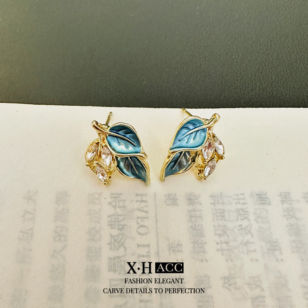 綠色鋯石花朵微鑲耳釘－商品主圖｜https://igowo.tw/