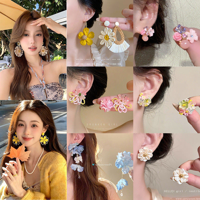白色花朵耳環－商品主圖｜https://igowo.tw/