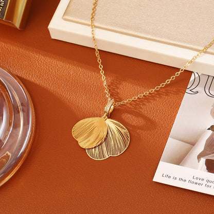 樹葉鏤空項鍊－金色蝶翼耳環款實拍｜https://igowo.tw/