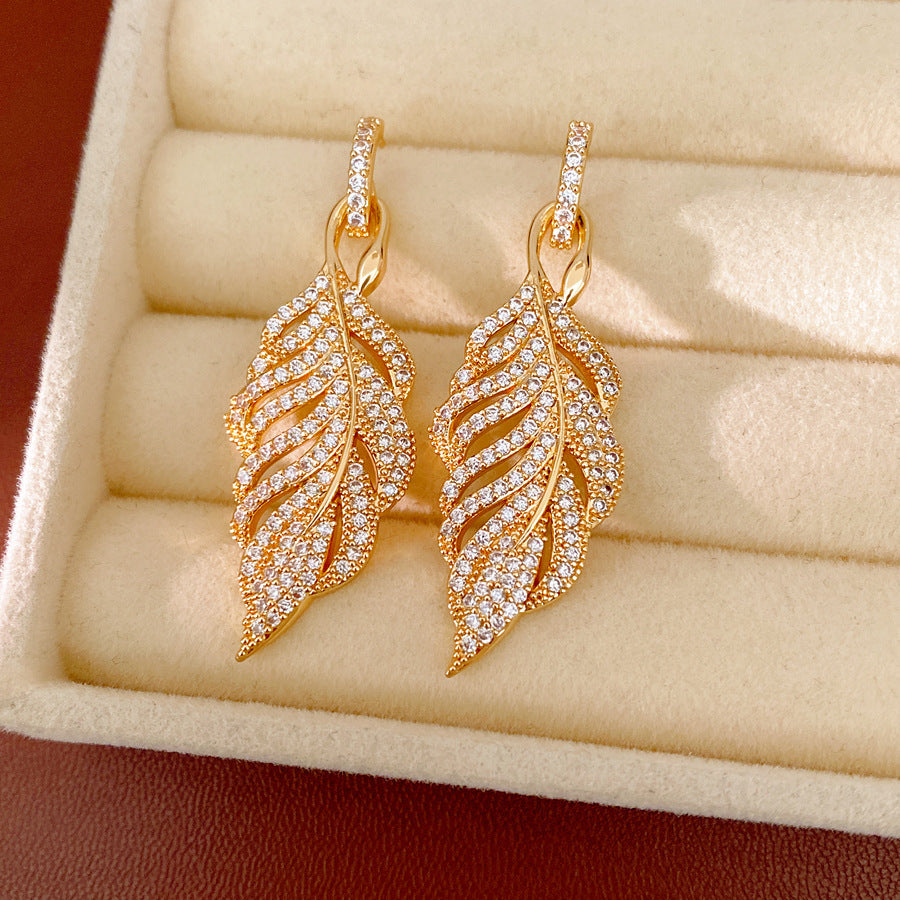 鋯石銀針樹葉鏤空耳釘