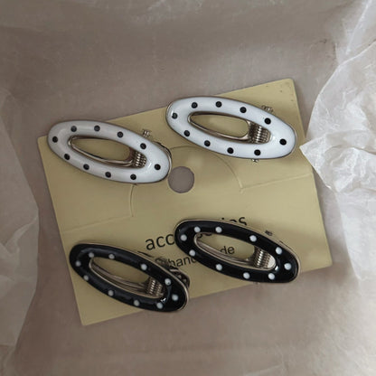 黑色金屬波點簡約髮夾－商品主圖｜https://igowo.tw/