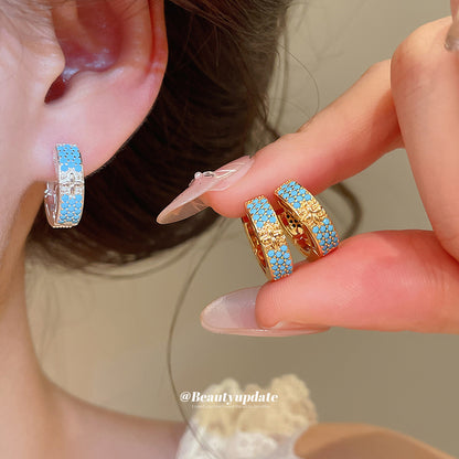 金色鋯石花朵小巧耳環－第二視角實拍｜https://igowo.tw/