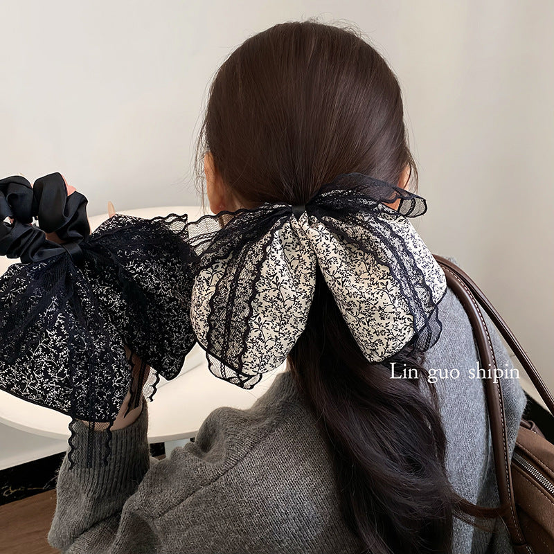 蕾絲碎花蝴蝶結髮圈－商品主圖｜https://igowo.tw/