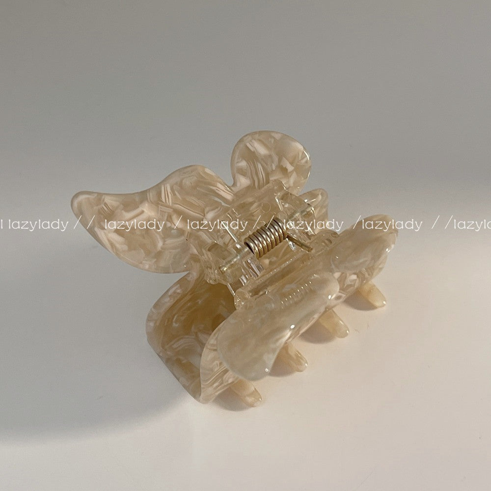 醋酸板材蝴蝶結鯊魚夾－米綠色款細節｜https://igowo.tw/
