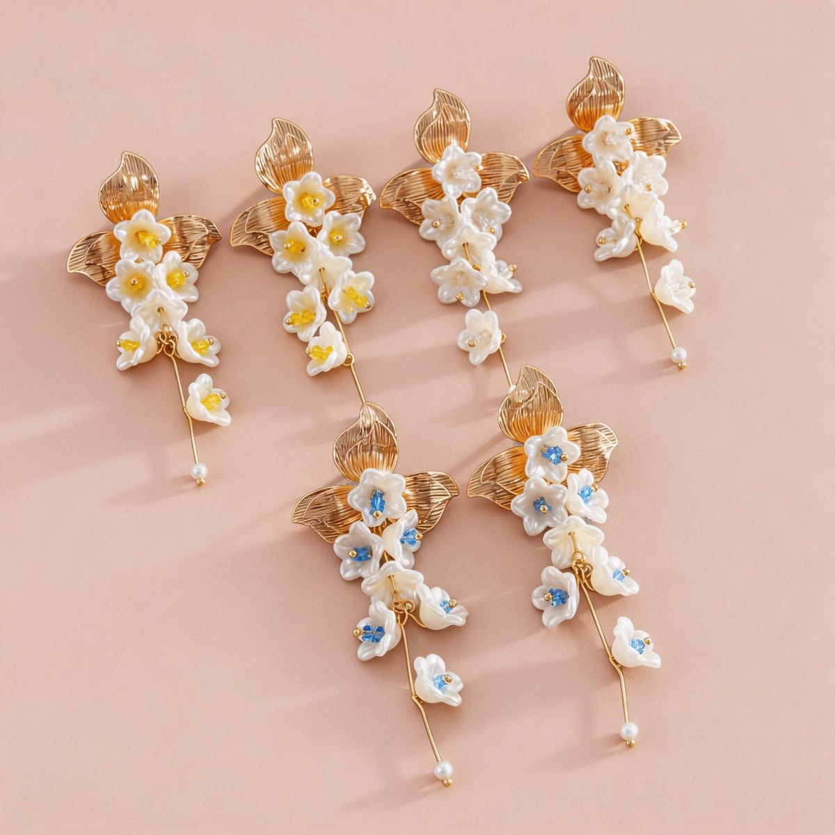 白色花朵流蘇拉絲耳釘－第二視角實拍｜https://igowo.tw/