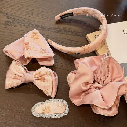 粉色小熊蝴蝶結髮圈－商品主圖｜https://igowo.tw/