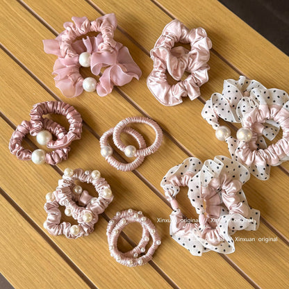 粉色珍珠彈力繩髮圈－商品主圖｜https://igowo.tw/