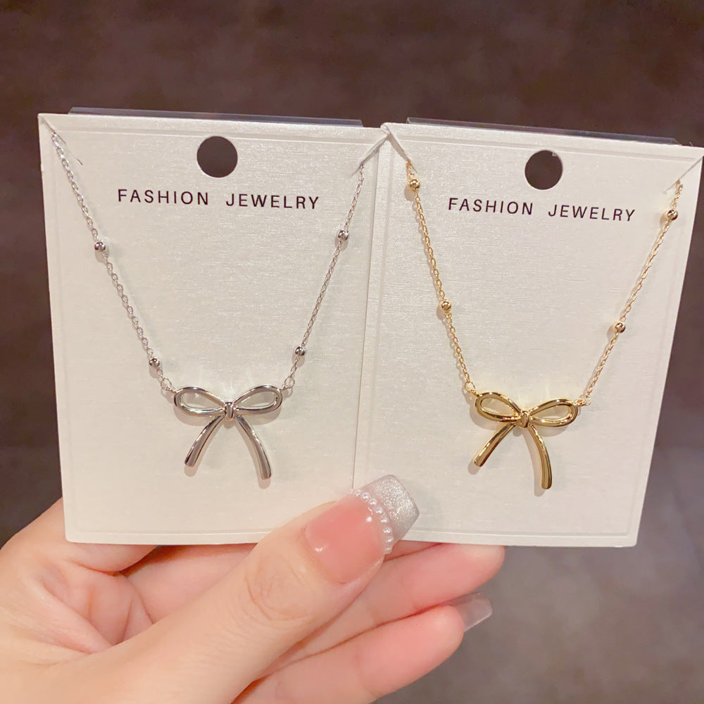 金屬蝴蝶結簡約項鍊－商品主圖｜https://igowo.tw/