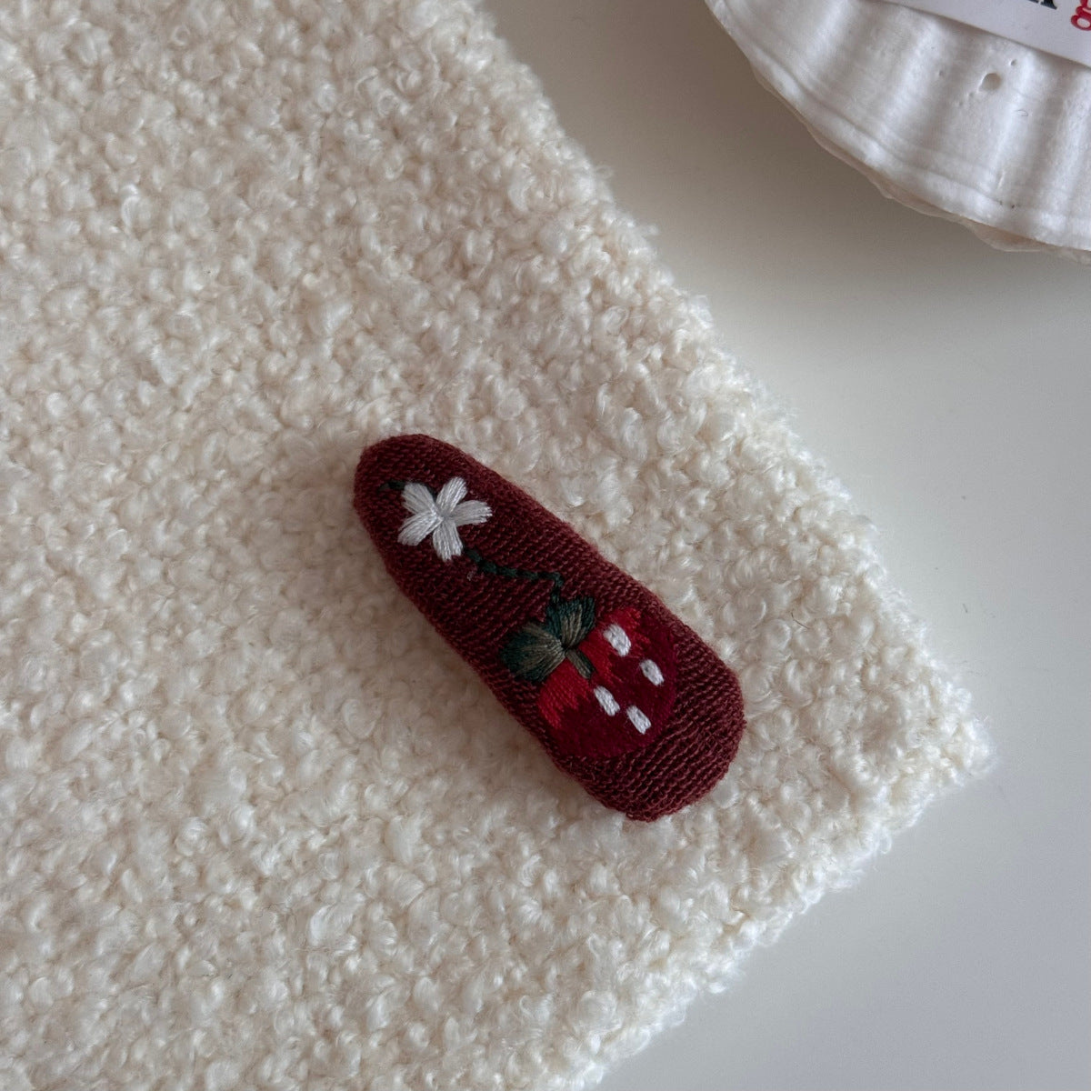 針織布面橢圓刺繡髮夾