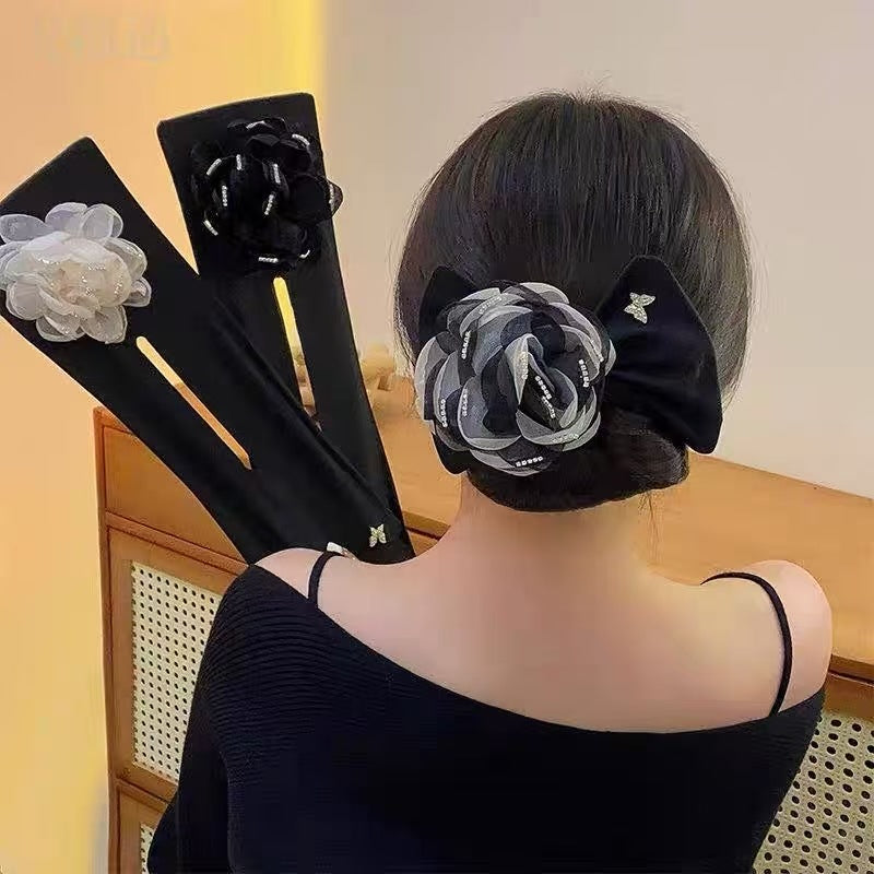 山茶花蝴蝶結髮夾－灰色款實拍｜https://igowo.tw/
