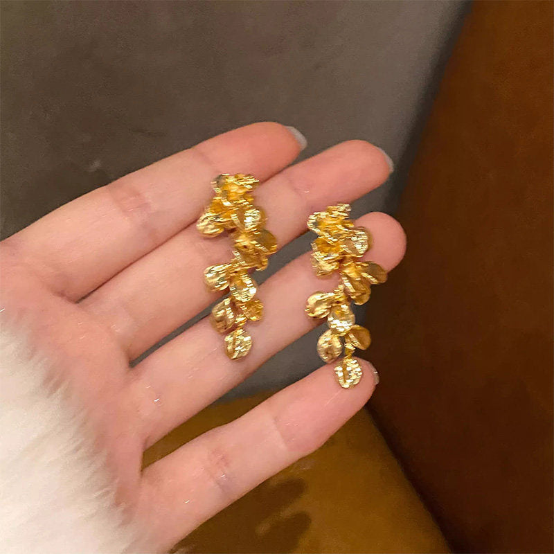 金色樹葉流蘇復古耳環－商品主圖｜https://igowo.tw/