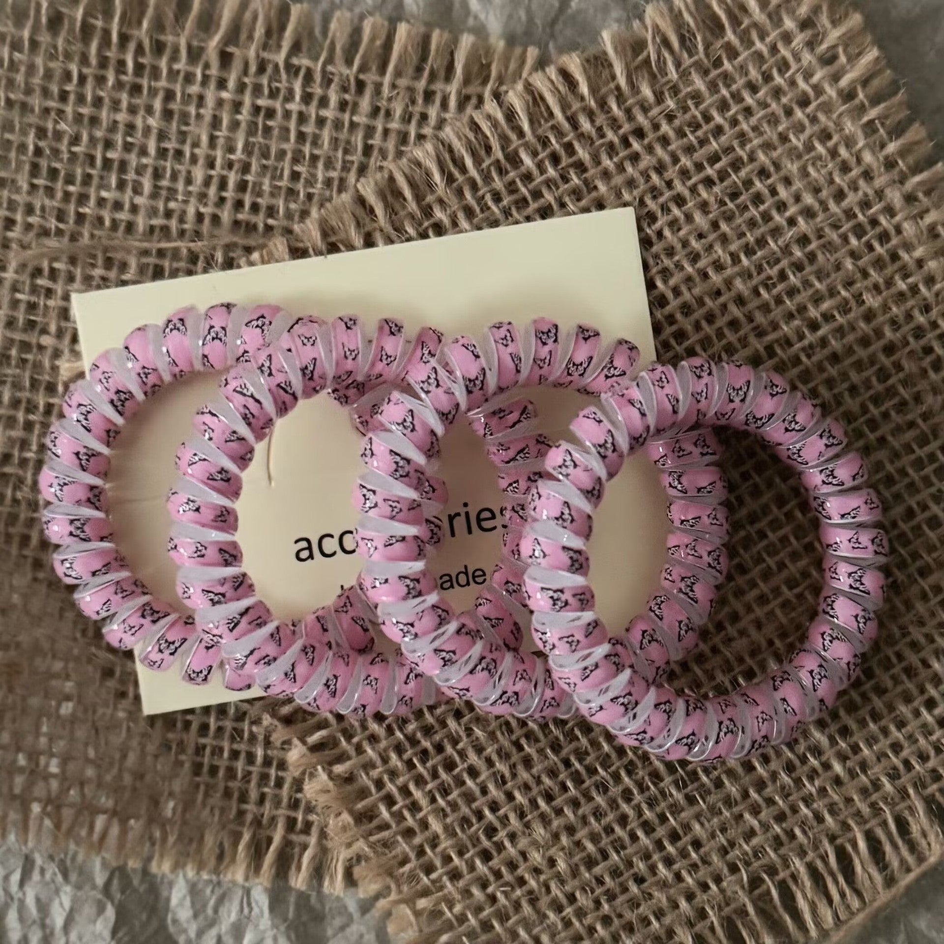 粉色蝴蝶簡約髮圈－商品主圖｜https://igowo.tw/