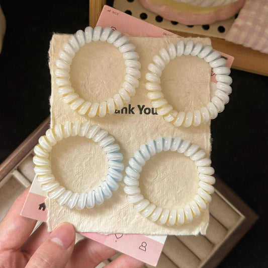 黃色簡約髮圈－商品主圖｜https://igowo.tw/