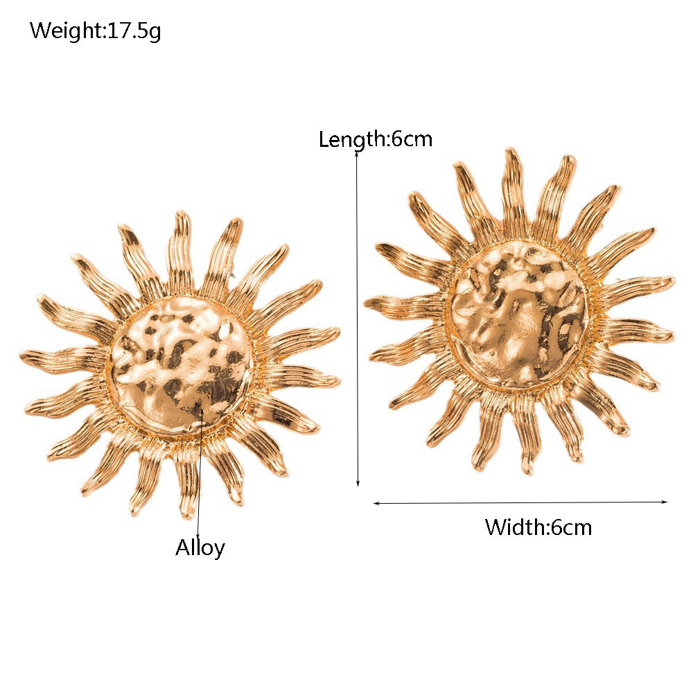 太陽花幾何耳環－銀色款實拍｜https://igowo.tw/