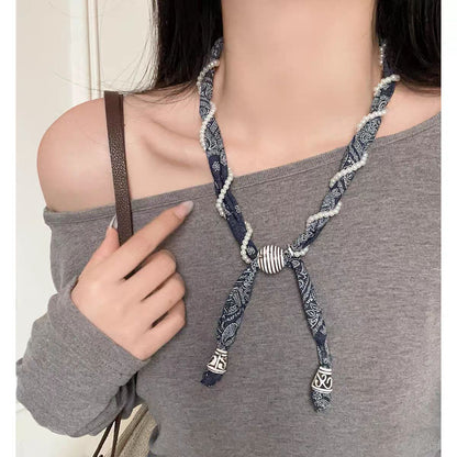 珍珠串珠纏繞項鍊－商品主圖｜https://igowo.tw/