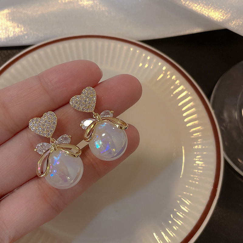 珍珠銀針花朵耳環－細節特寫48｜https://igowo.tw/