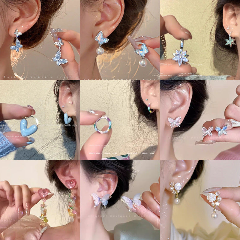 S925珍珠蝴蝶圓圈耳環－商品主圖｜https://igowo.tw/