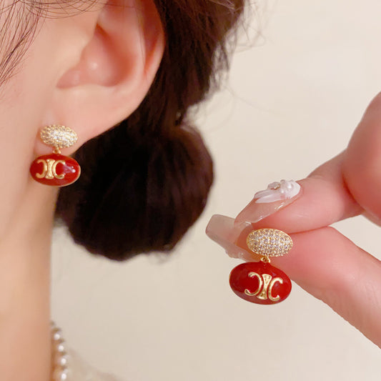 紅色鋯石橢圓耳墜－商品主圖｜https://igowo.tw/