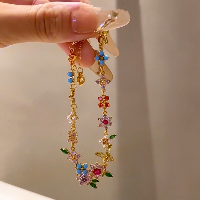 金色鋯石花朵電鍍耳環－銀針-金色-彩色款實拍｜https://igowo.tw/
