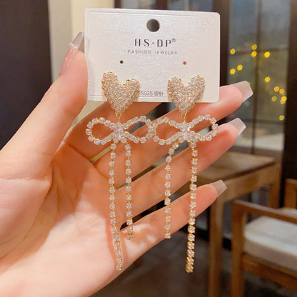 鋯石愛心流蘇耳墜－商品主圖｜https://igowo.tw/