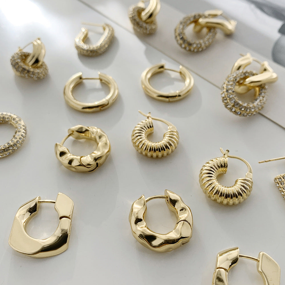 金色不鏽鋼不規則耳環－商品主圖｜https://igowo.tw/