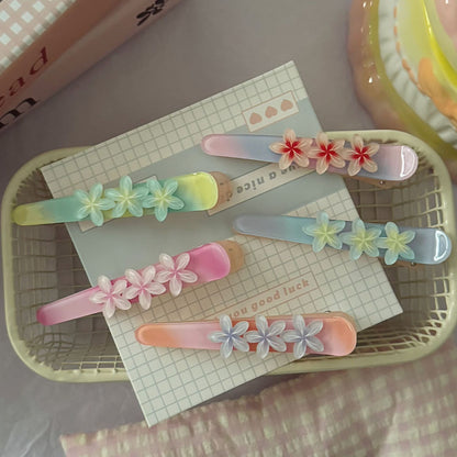 粉色花朵髮夾－商品主圖｜https://igowo.tw/