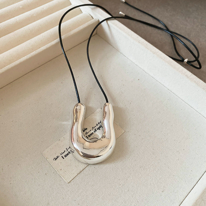 銀色貝殼墜飾精雕項鍊
